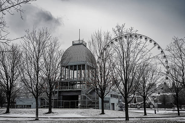 The Montreal biosphere is lit by a system of rotating projectors. Colors change slowly during the night. For the duration of the Covid 19 pandemic Montreal decided to change the colors to that of the rainbow. Parc Jean Drapeau, Île Ste-Hélène, Montreal.