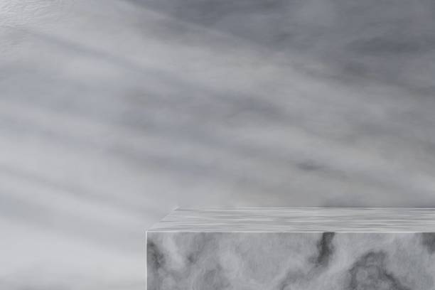 istock 3d Rendering Mockup Minimal Concrete Product Display Podium or Marble Concrete Product Display, Sunlight Shadow Palm Tree On Cement Wall or Marble wall, abstract Illustration Background 3d rendering. 2253705142