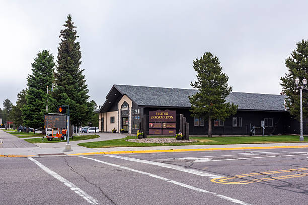 West Yellowstone, MT, USA - July 4th, 2025: Visitor Center on the street intersection