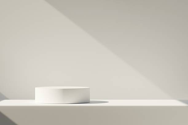 istock Abstract 3D realistic white cylinder podium pedestal background with natural lighting wall scene. Minimal mockup product display presentation, Stage for showcase. Platforms geometric design. 3d render 2253708732