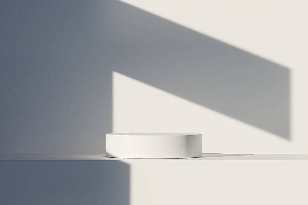 istock Abstract 3D realistic white cylinder podium pedestal background with natural lighting wall scene. Minimal mockup product display presentation, Stage for showcase. Platforms geometric design. 3d render 2253708747