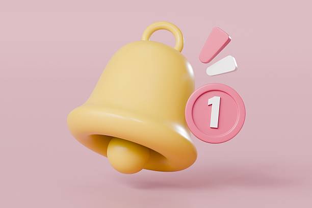 istock 3d notification bell icon isolated on pink background. 3d yellow ringing bell with new message notification for social media reminder. Notices phone app concept. Minimal Cartoon icon design. 3d render 2253710528