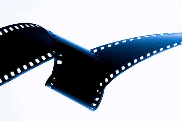 Film strip template with three blank or empty frames, developed 135 type or 35mm film placeholder on white, real film grain