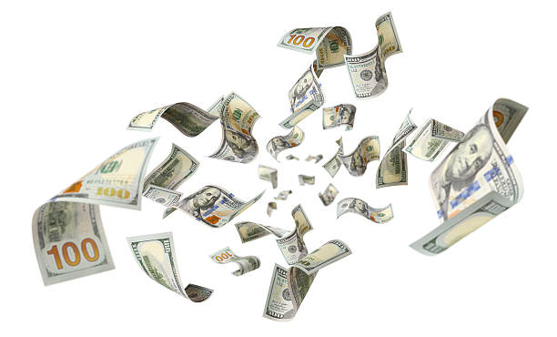 istock Flying hundred dollar banknotes, isolated on white background 2253724855