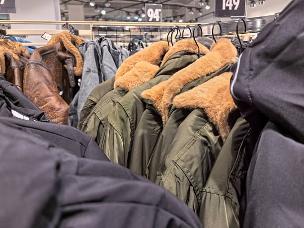 istock Exploring a vibrant clothing store with stylish jackets on display 2253726800