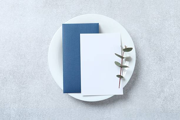 istock Wedding stationery invitation card mockup on grey background with eucalyptus, Menu card mockup with festive wedding or birthday table setting, ceramic plate. Minimal blank card mockup 2253731304