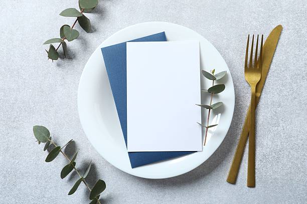 istock Wedding stationery invitation card mockup on grey background with eucalyptus, Menu card mockup with festive wedding or birthday table setting, ceramic plate. Minimal blank card mockup 2253731305
