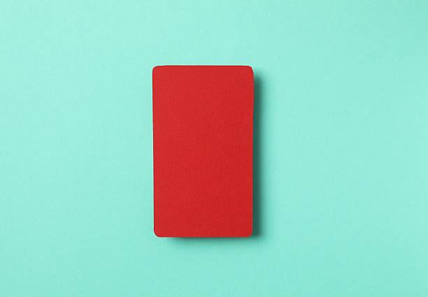 istock Red paper card on color background 2253731389