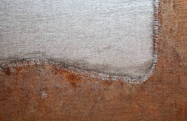 Close-up of a canvas patch from a restoration