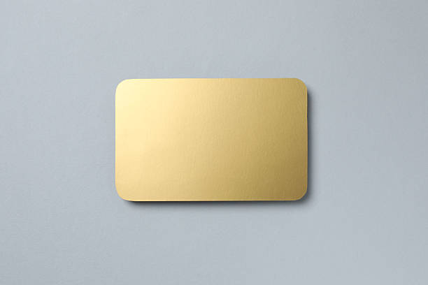 istock Golden paper card on grey background 2253732536