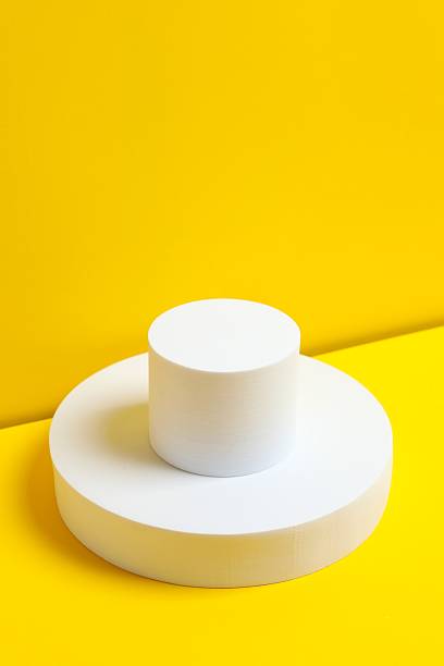 istock White podiums on a yellow background 2253733127