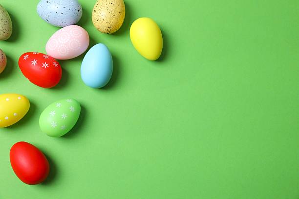 istock Happy Easter. Colorful eggs on color background, space for text or advertising 2253733173