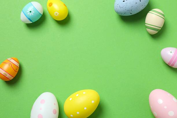 istock Happy Easter. Colorful eggs on color background, space for text or advertising 2253733227