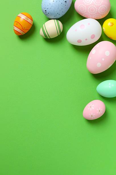 istock Happy Easter. Colorful eggs on color background, space for text or advertising 2253733230