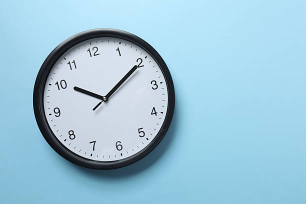 istock Big beautiful stylish clock on color background 2253733732