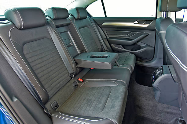 istock Rear seats covered with fabric in a luxury car 2253734693