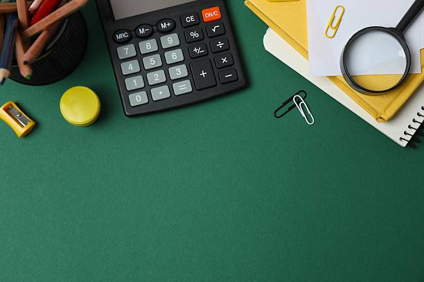 istock Flat lay with stationery on green background, top view 2253735049