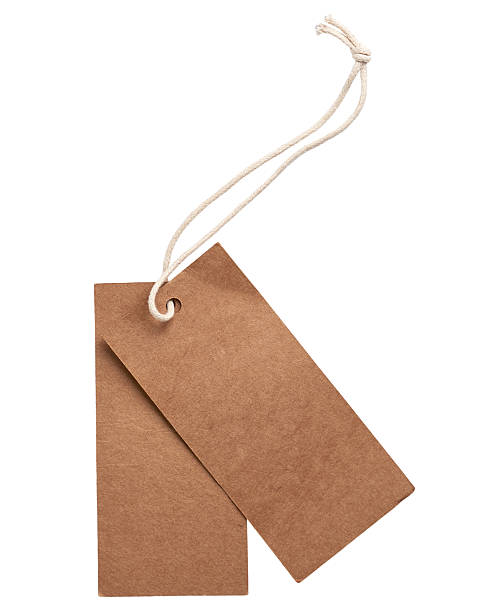 istock Two blank brown craft paper tags on a light rope 2253735077