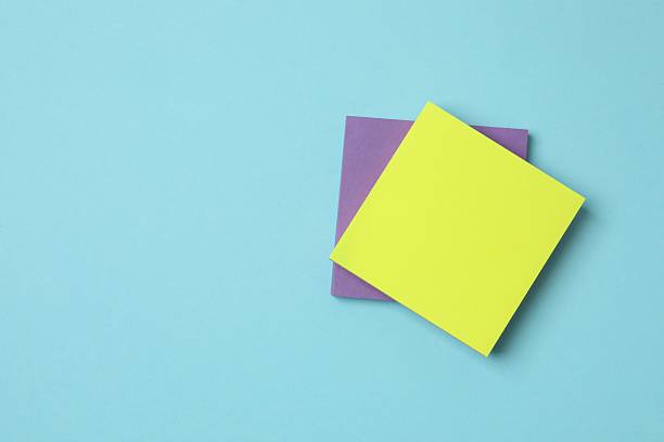 istock Multicolored paper stickers on a blue background 2253735257
