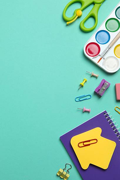 istock Flat lay with school stationery on color background, top view 2253735429