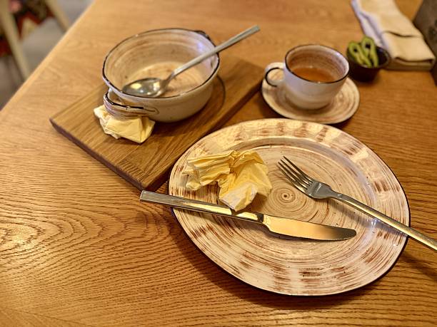 Charming Rustic Dining, Comfortable Setting Featuring Gentle Lighting And Wooden Utensils Ambiance, Homely Atmosphere With Soft Illumination And Authentic Wooden Tableware For Dinner