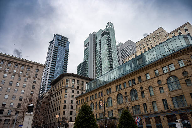 Old and new buildings downtown Montreal during winter day