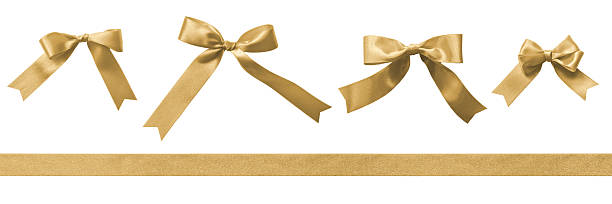 istock Gold bow satin ribbon stripe set isolated on white background with clipping path for Christmas, birthday and wedding card confetti design decoration element 2253746843
