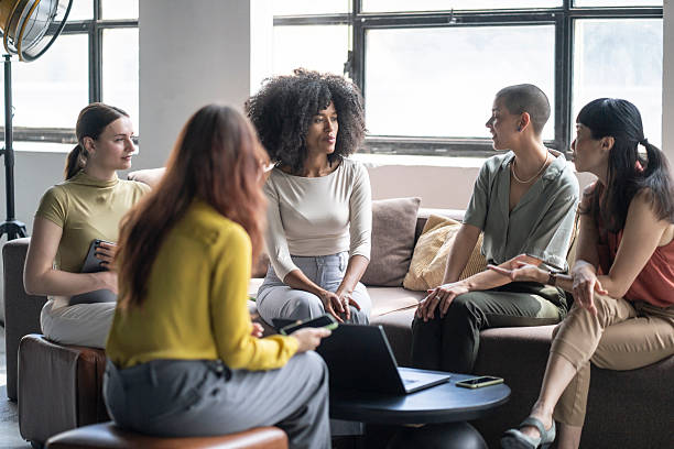 istock Creative businesswomen having a meeting in modern office 2253747030