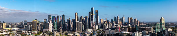 istock A panoramic view showcasing Melbourne's impressive modern skyline, with numerous towering skyscrapers dominating the urban landscape under a vast blue sky. 2253748134