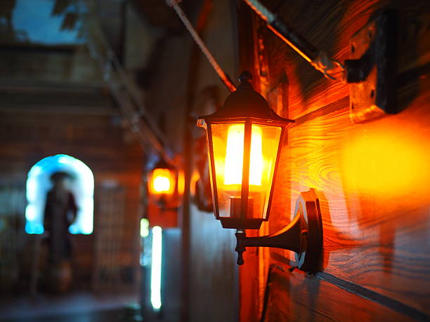 Woman Holding Retro Lantern