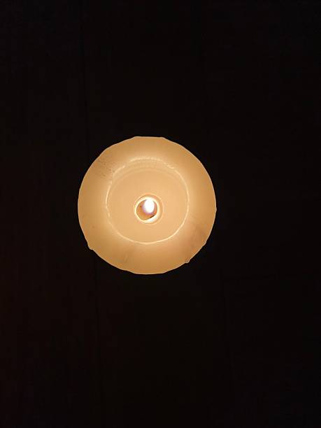 istock Single full top down flame - Minimal Candlelight Scene in Dark Cozy Interior 2253751790