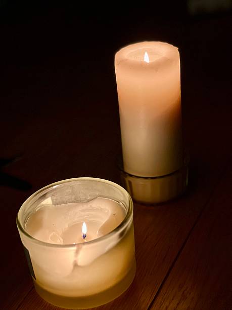 istock Lit Candles Creating Warm and Calm Indoor Atmosphere 2253751805