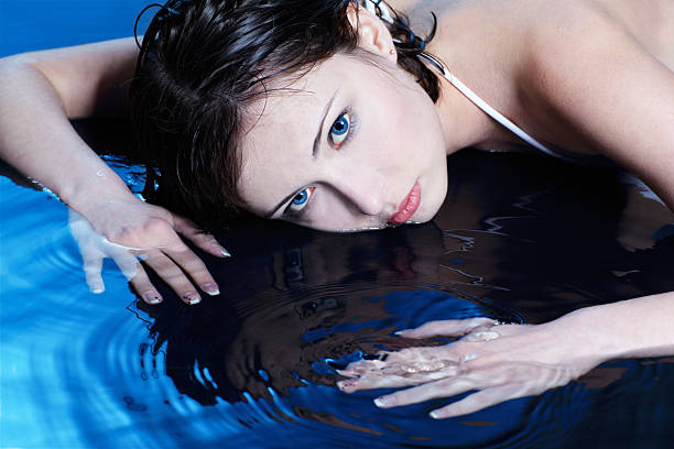 istock beautiful female on blue 2253754274
