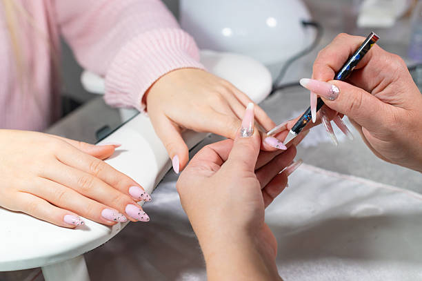 istock Manicure process and nail care in the modern nail salon 2253758100
