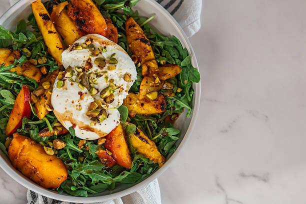 istock Fresh Grilled Peach and Burrata Salad 2253758216