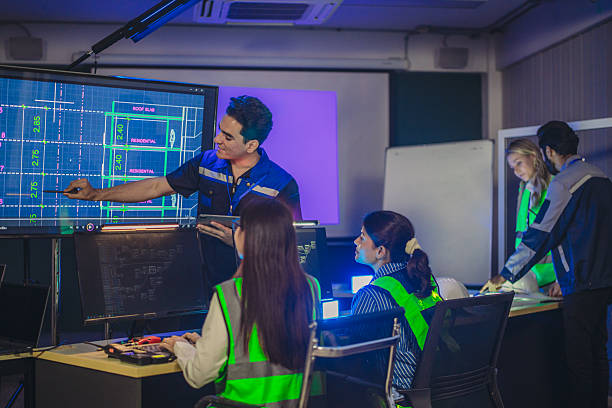 Engineer working in control room.