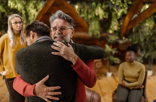 istock Multiethnic  group support session with adults sharing emotions indoors 2253762848