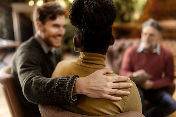 istock Multiethnic  group support session with adults sharing emotions indoors 2253762931
