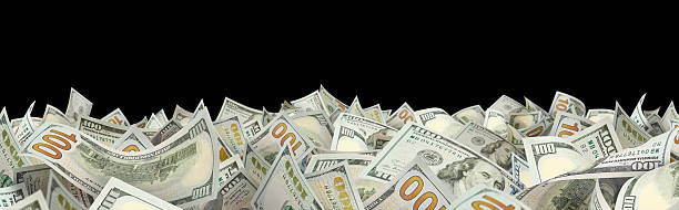 istock Hundred dollar bills forming a lower frame, isolated on black background 2253764623