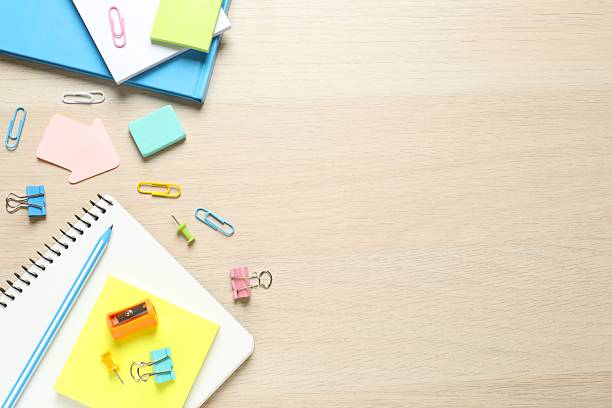 istock Flat lay with school stationery on wooden background, top view 2253769736