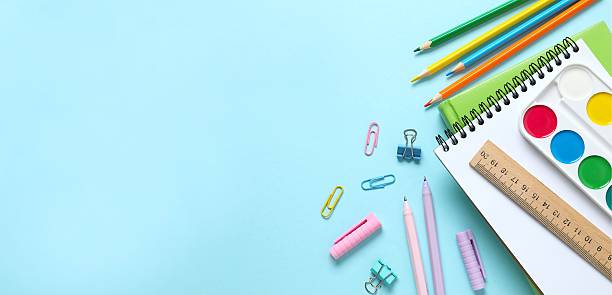istock Flat lay with school stationery on color background, top view 2253770582