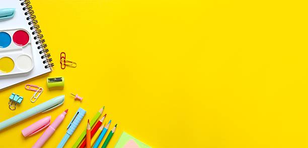 istock Flat lay with school stationery on color background, top view 2253770589
