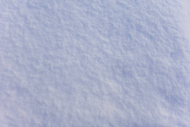 istock Fresh snow surface close up showing soft fluffy white texture de 2253770704