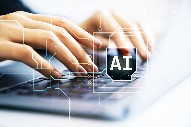 istock Human hands typing on laptop keyboard with AI interface overlay symbolizing artificial intelligence and machine learning technology concept. 2253770827