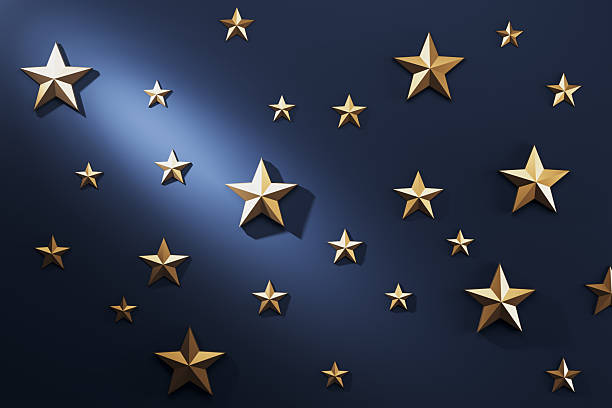 istock Golden 3D stars scattered on a dark blue background with spotlight effect creating a magical and festive texture backdrop for New Year celebration. 3D Rendering 2253771113
