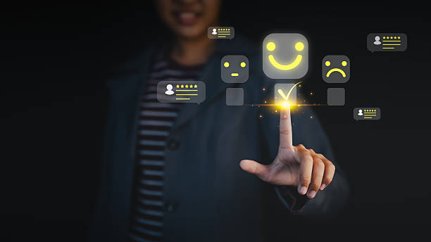 istock Customer satisfaction survey concept showing a happy smile face icon rating system through online application, testimonial, customers evaluate product and service quality and share feedback review. 2253774379