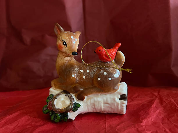 Deer and bird Christmas ornament
