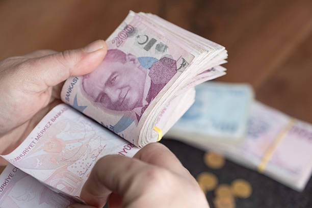 istock A person is counting paper money. 2253782054