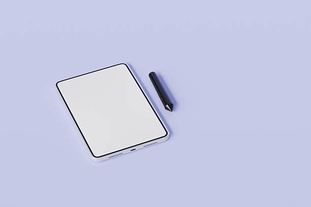 Tablet with blank screen template, digital pen, cup of coffee and female accessories. Elegant feminine workspace in sunlights.