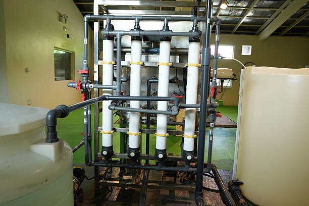 istock An expansive industrial water filtration system with multiple vertical filter columns. 2253787753